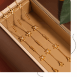 Gold-Plated Daisy Charm Bracelet – Zircon Accent & Titanium Steel