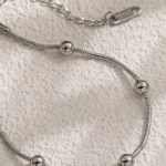 Titanium Steel Snake Chain Bracelet with Polished Beads – Adjustable Fit