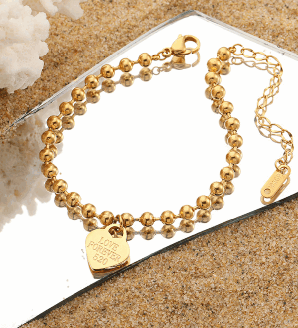 9471af9f501c3e6f900d2dd027118be Titanium Steel Bead Bracelet with Engraved Heart Charm – Adjustable Chain