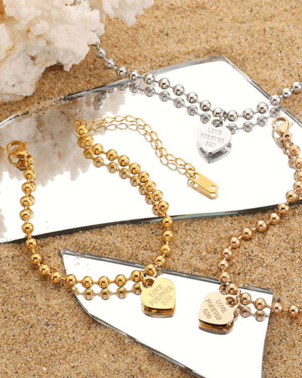af201c194ffefb37fbbf5201dda682d Titanium Steel Bead Bracelet with Engraved Heart Charm – Adjustable Chain