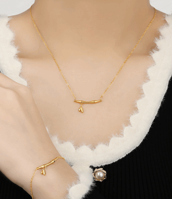 b61f65a6c9466eb78131f4ac47fd8ee Bar Pendant Necklace & Bracelet Set – Minimalist Titanium Steel with Drop Detail
