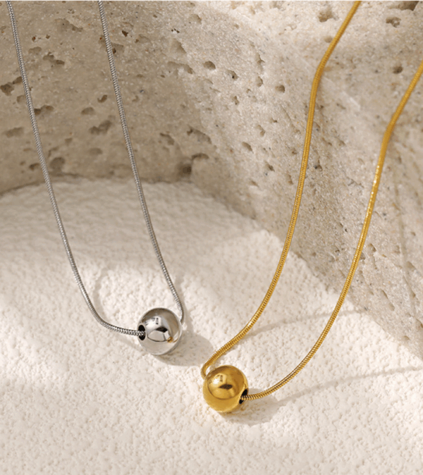 c4cdf7743802ad77175853759c25c5f Minimalist Polished Sphere Necklace – Titanium Steel Chain with Bead Pendant