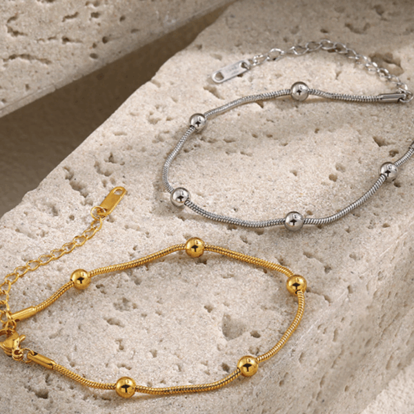 Titanium Steel Snake Chain Bracelet with Polished Beads – Adjustable Fit