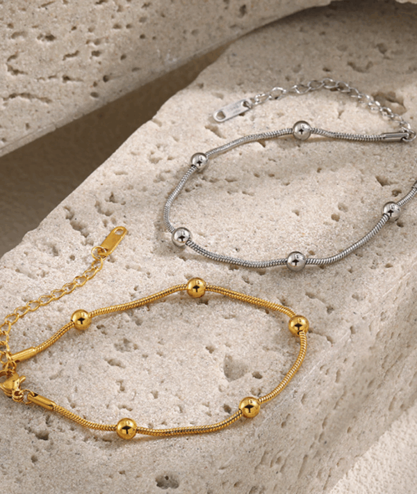Titanium Steel Snake Chain Bracelet with Polished Beads – Adjustable Fit