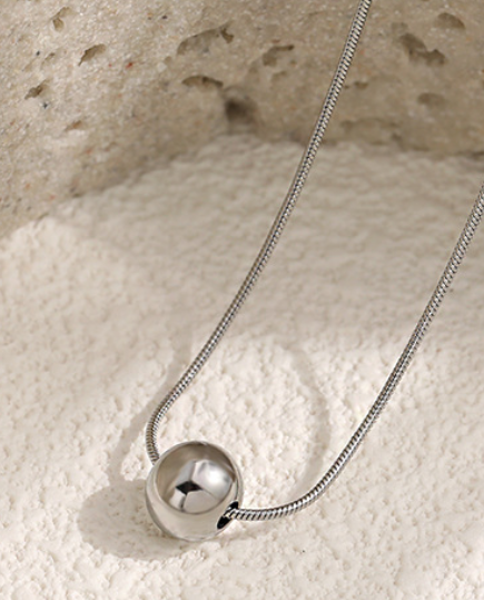 e0e79ada2b006928fb57bf8bd11b4fd Minimalist Polished Sphere Necklace – Titanium Steel Chain with Bead Pendant